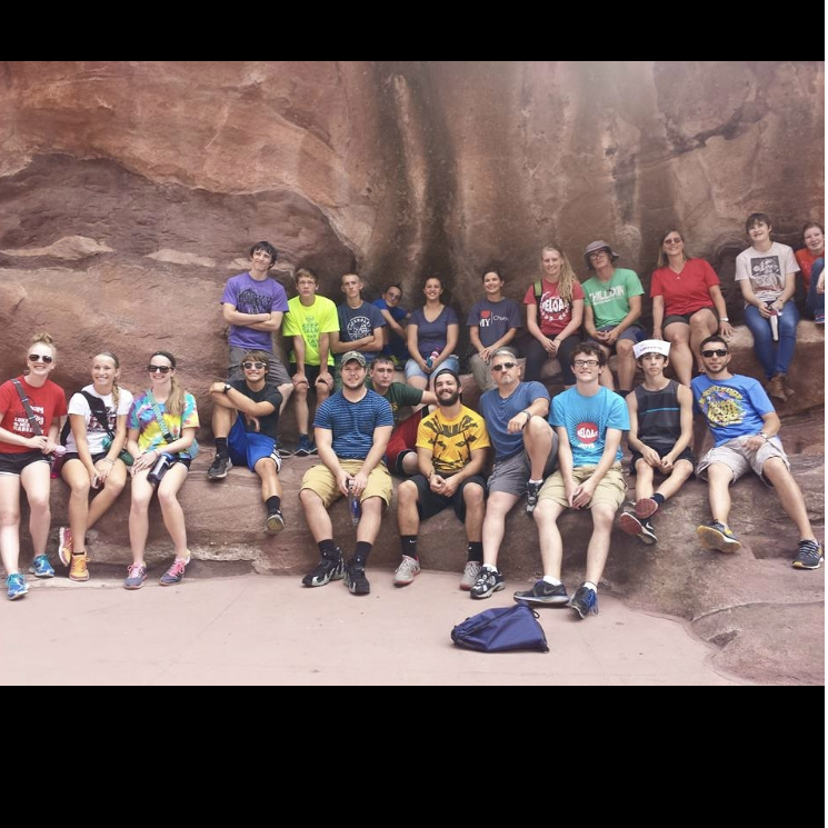 Mission trip to Denver, Colorado. Grant is in the front row in the yellow t-shirt, Audrey is in the back row behind Grant in the red t-shirt.
