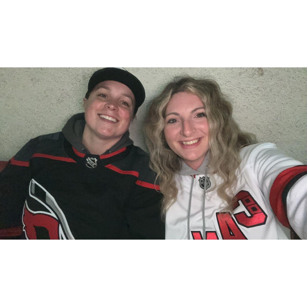 Britt's younger self would be so disappointed... She's wearing Canes gear to a Canes/Bruins game!
