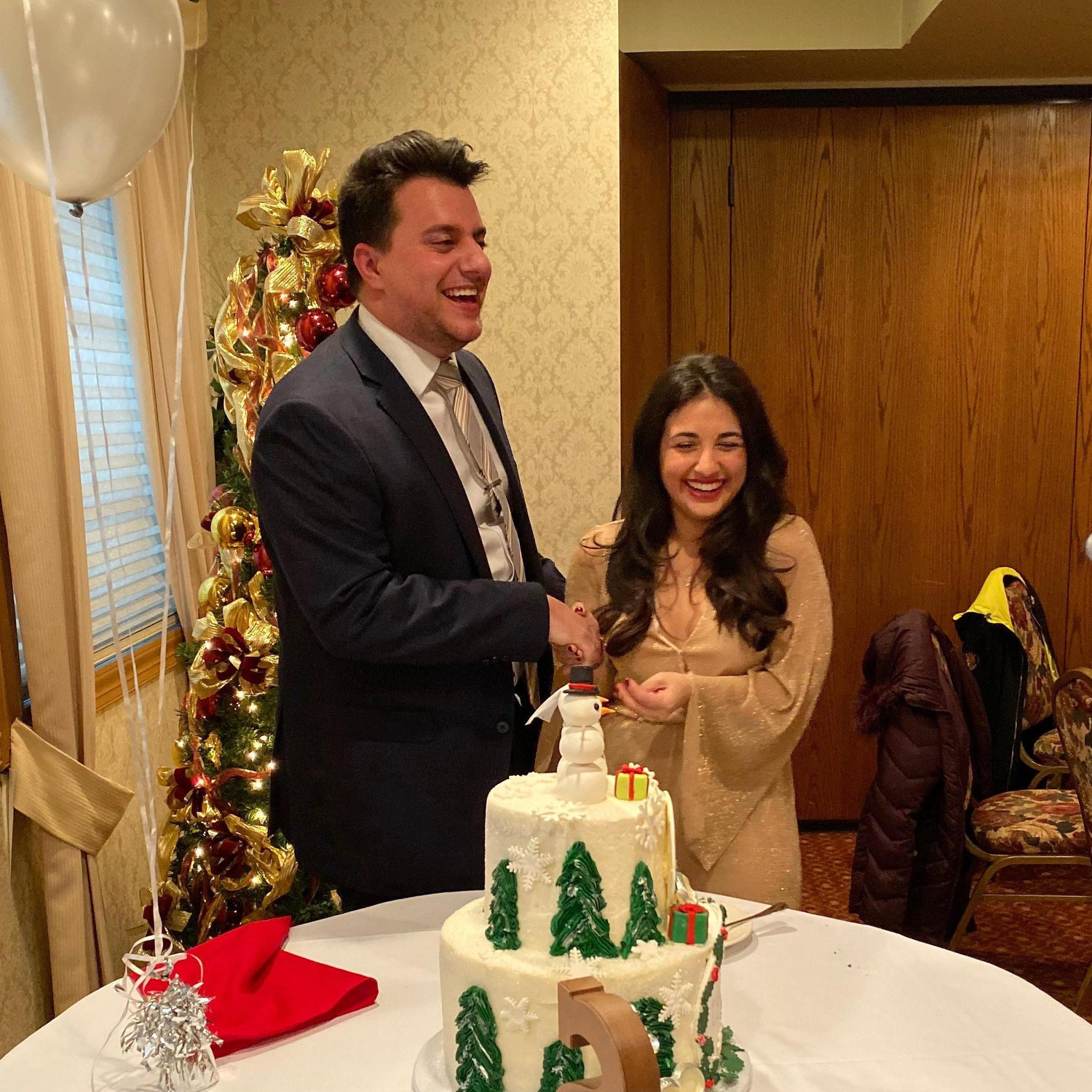 Our first Christmas as an engaged couple. We can't wait to have our own tree someday soon.