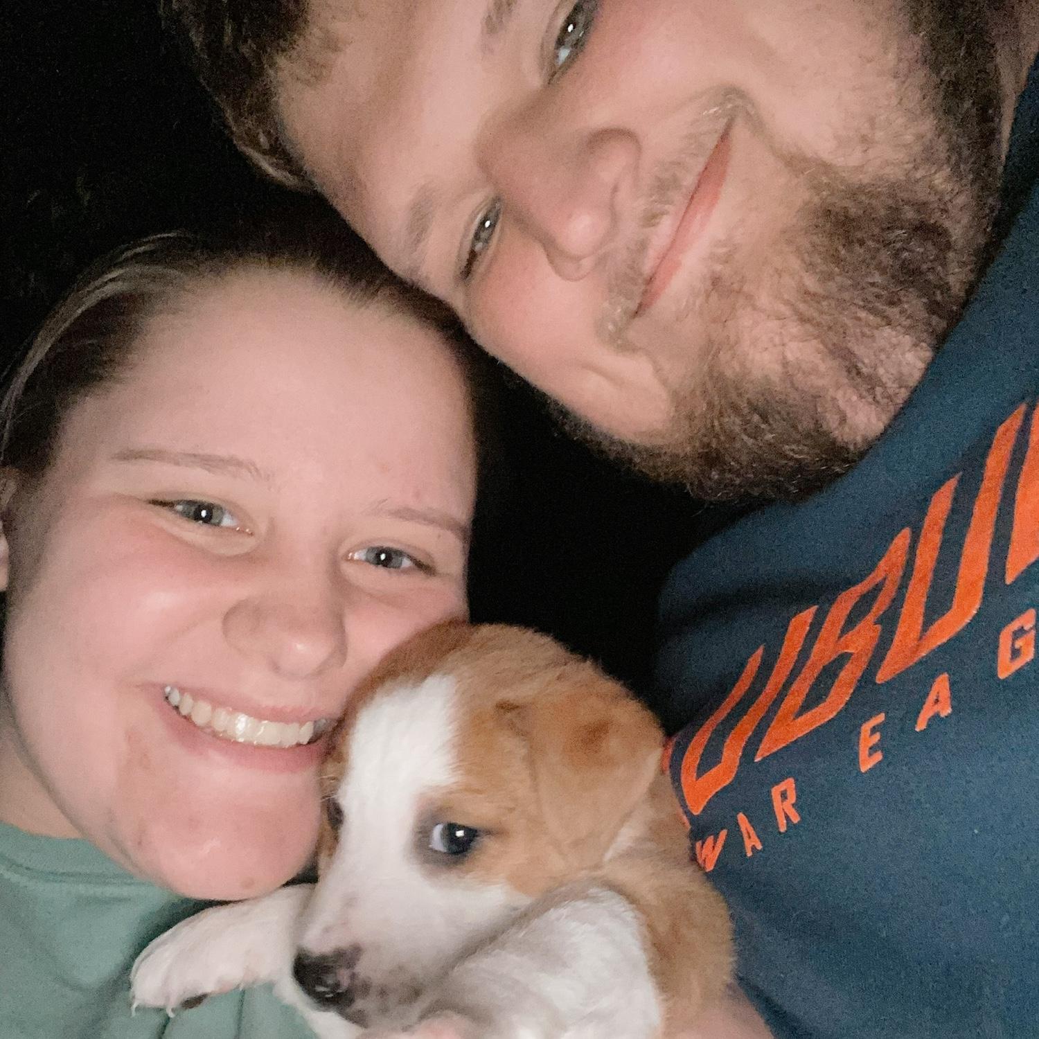 This was taken the night Garrett and Kaitlyn rescued their first fur baby, Granger. He was, and still is, a well-loved, spoiled, and shy COVID puppy.