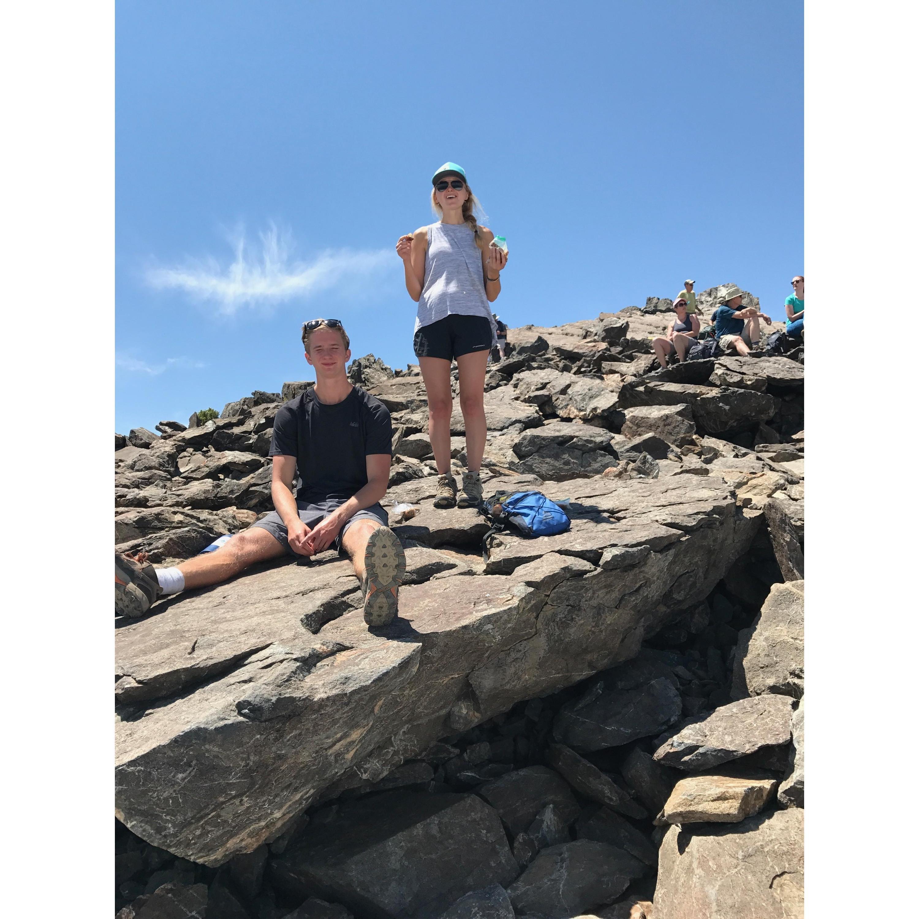 Enjoying some snacks on the top of Mount Tallac.