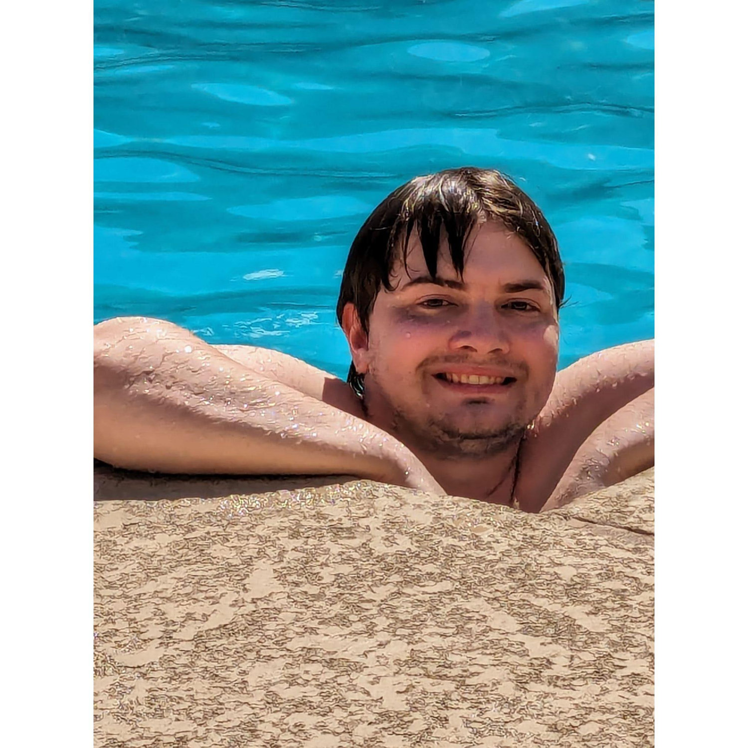 Robert in the pool at our apartment