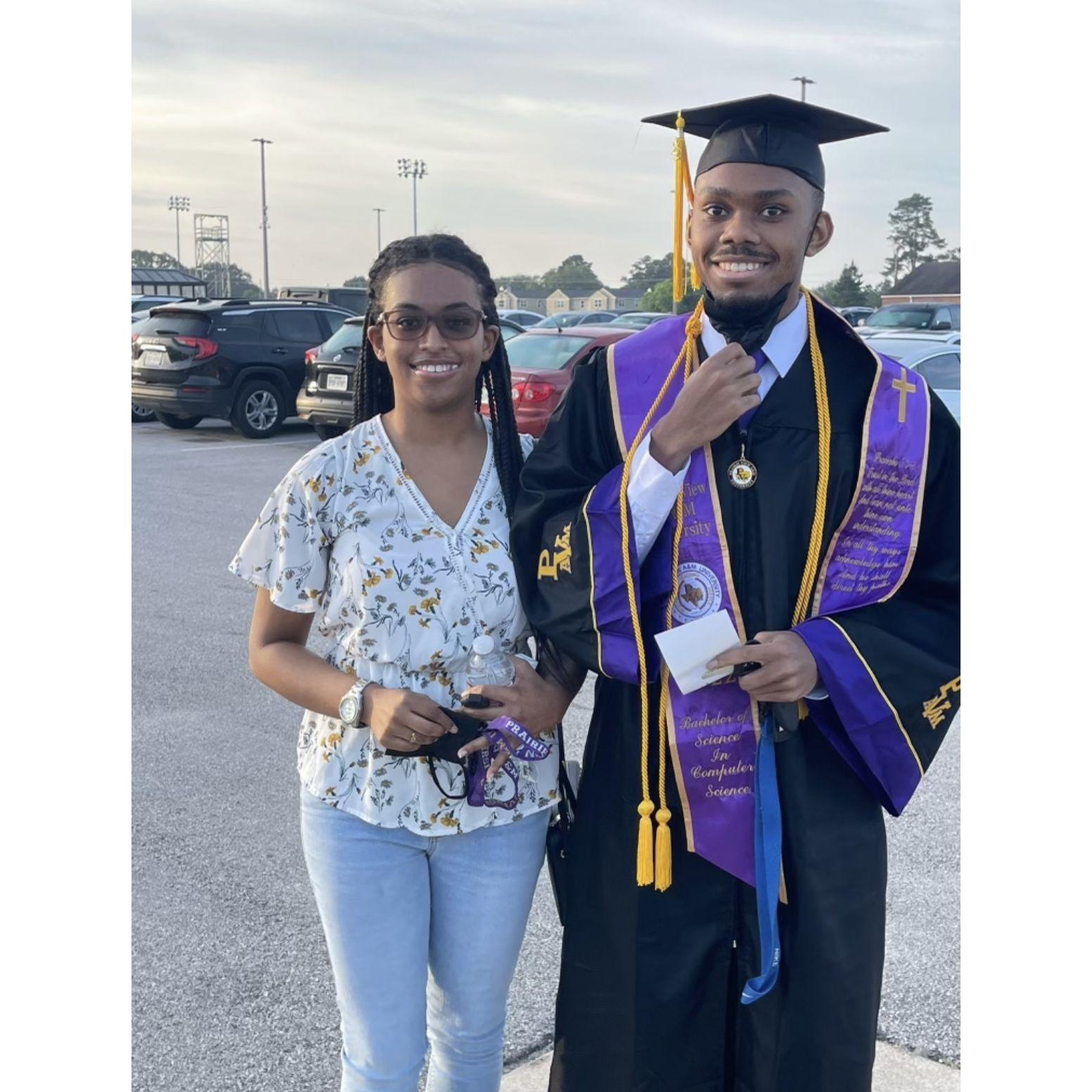 Before Alfred's graduation ceremony, we took pictures together to remember the special day before he walked down the stage.