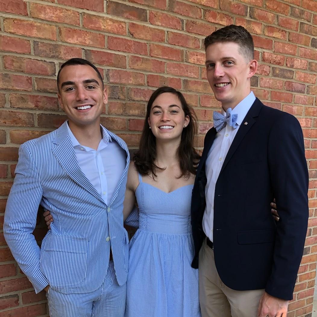An iconic photo of the bride, groom, and best man sporting their Sunday best--seersucker! (And yes, this was coordinated.)