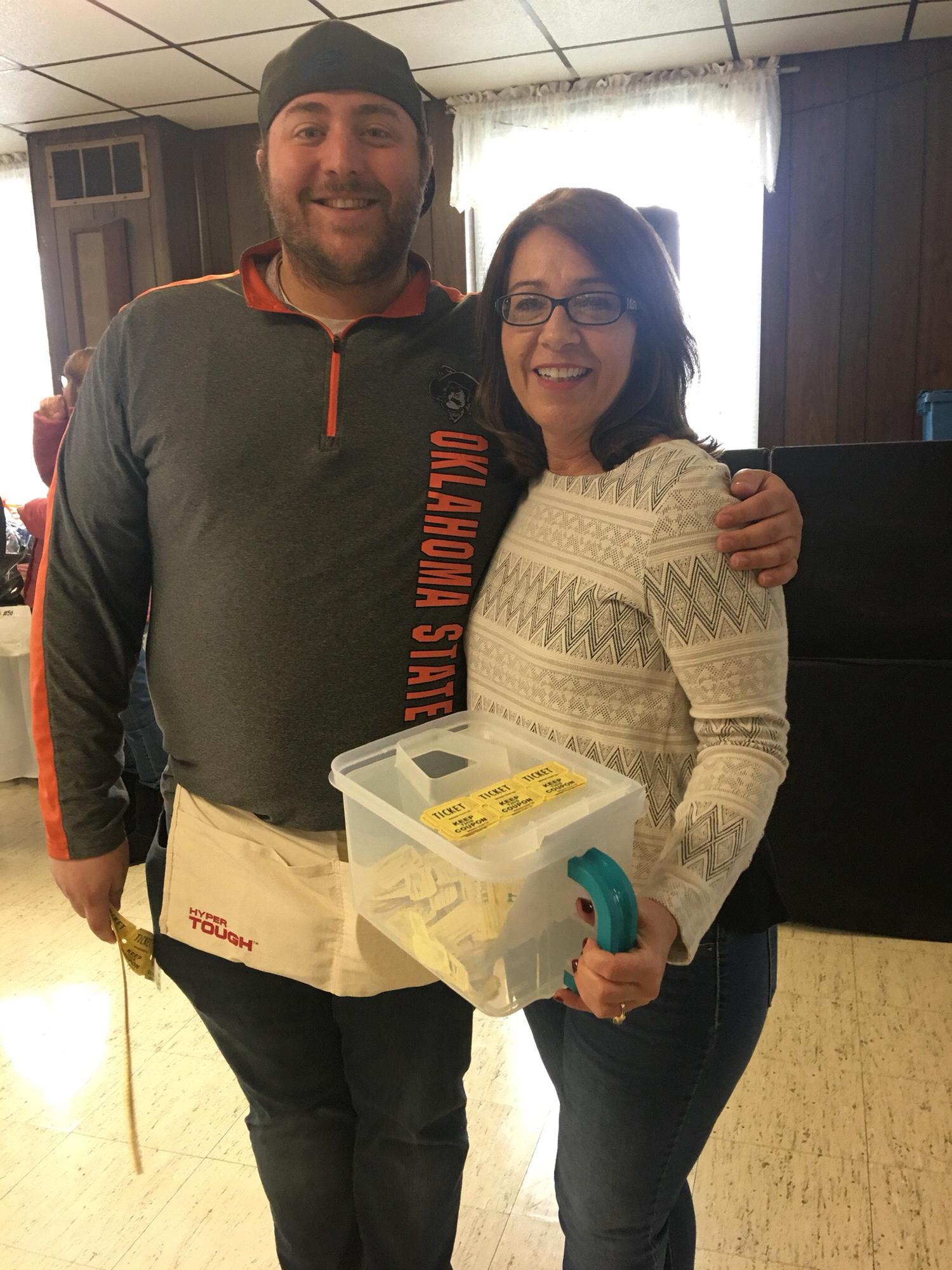 PJ and my mom selling raffle tickets at my sisters benefit!
