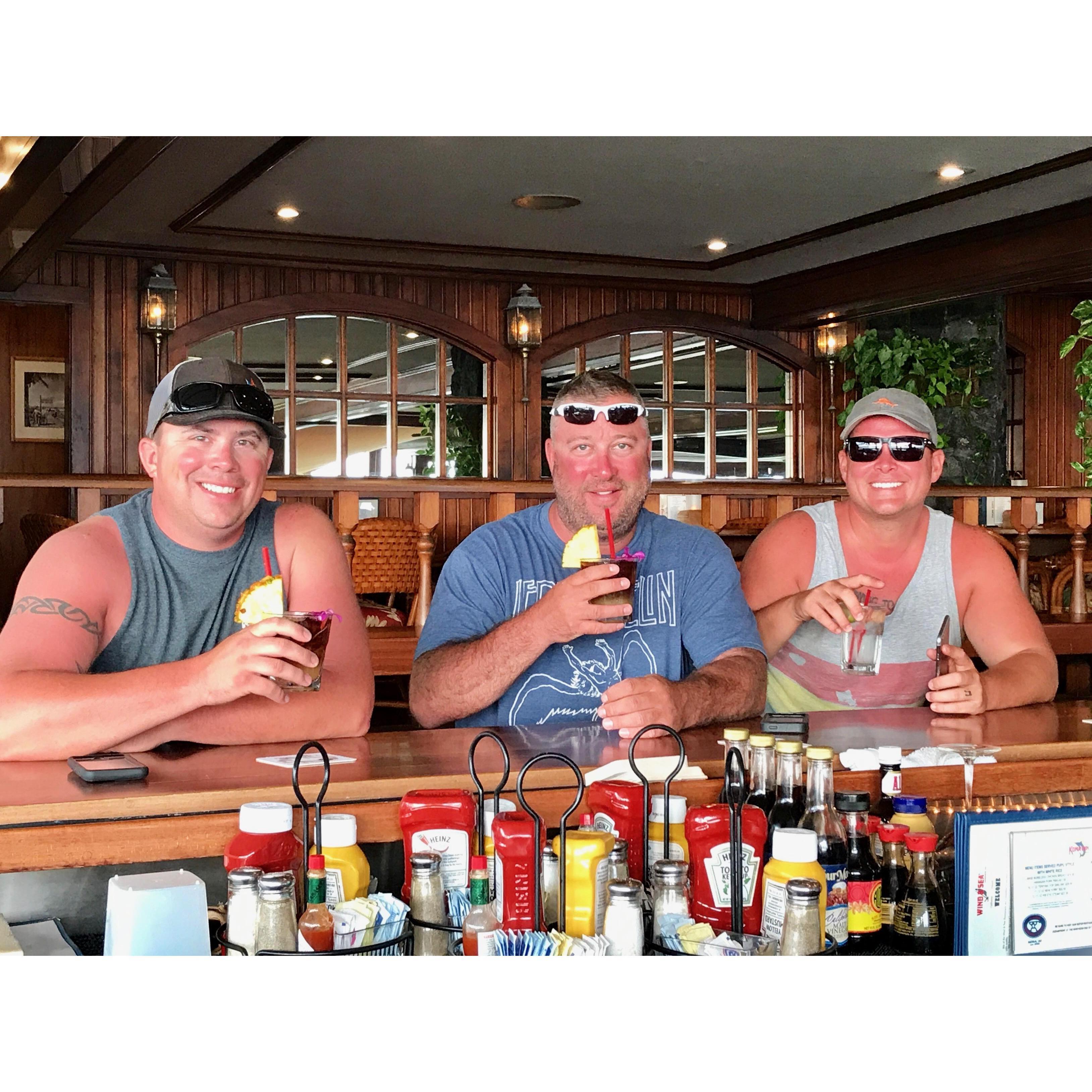 Scott, Rico and Chad showing off their sunburns and enjoying the famous mai tais at Kona Inn