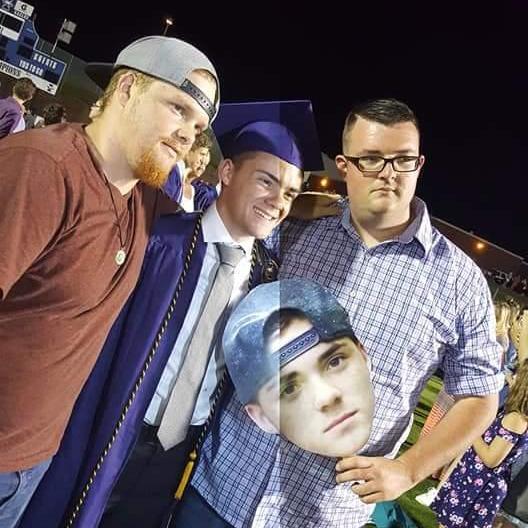 The day Damien found out he had a good twin, he is the evil twin. (See big head) Happy graduation day son!!