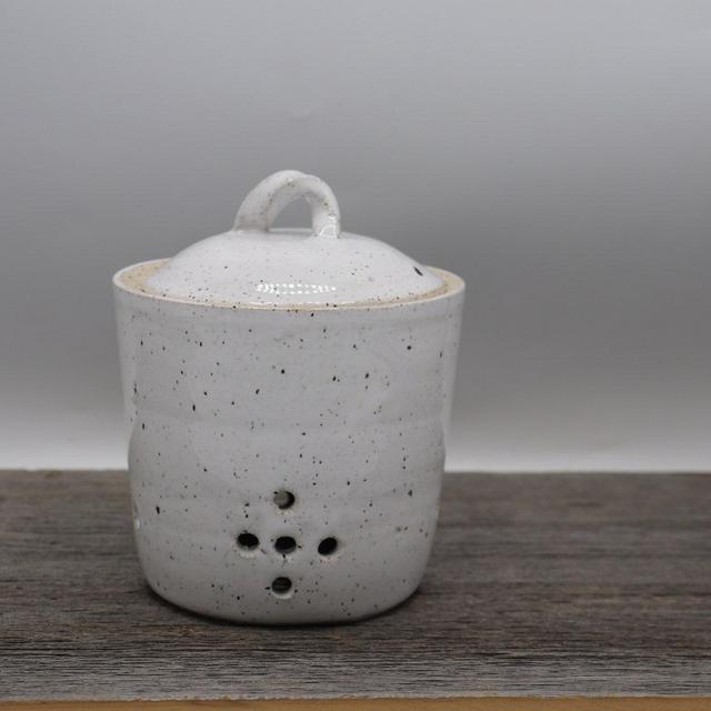 Garlic storage ceramic jar with lid, made from spackled stoneware clay and glazed with white glaze