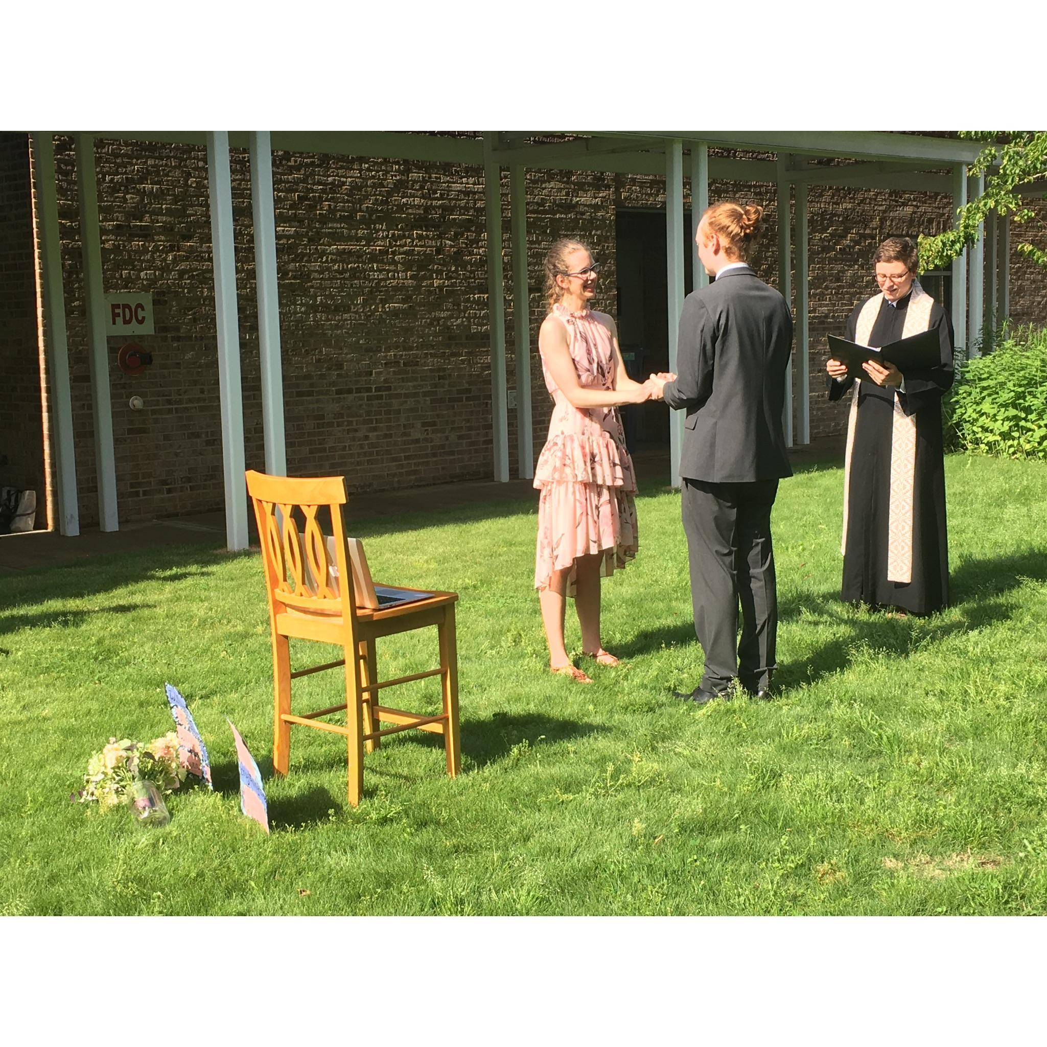 Dan reads his vows to his beautiful bride.