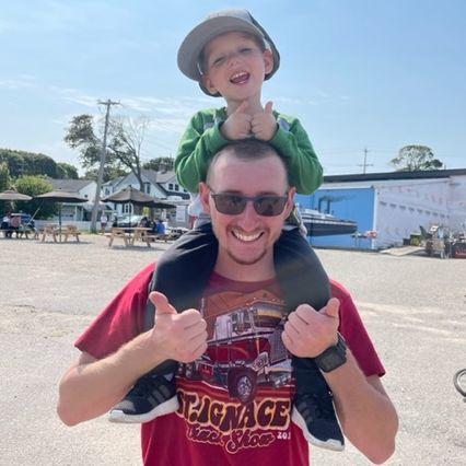 Parker and dad up at the Tractor crossing in St. Ignace