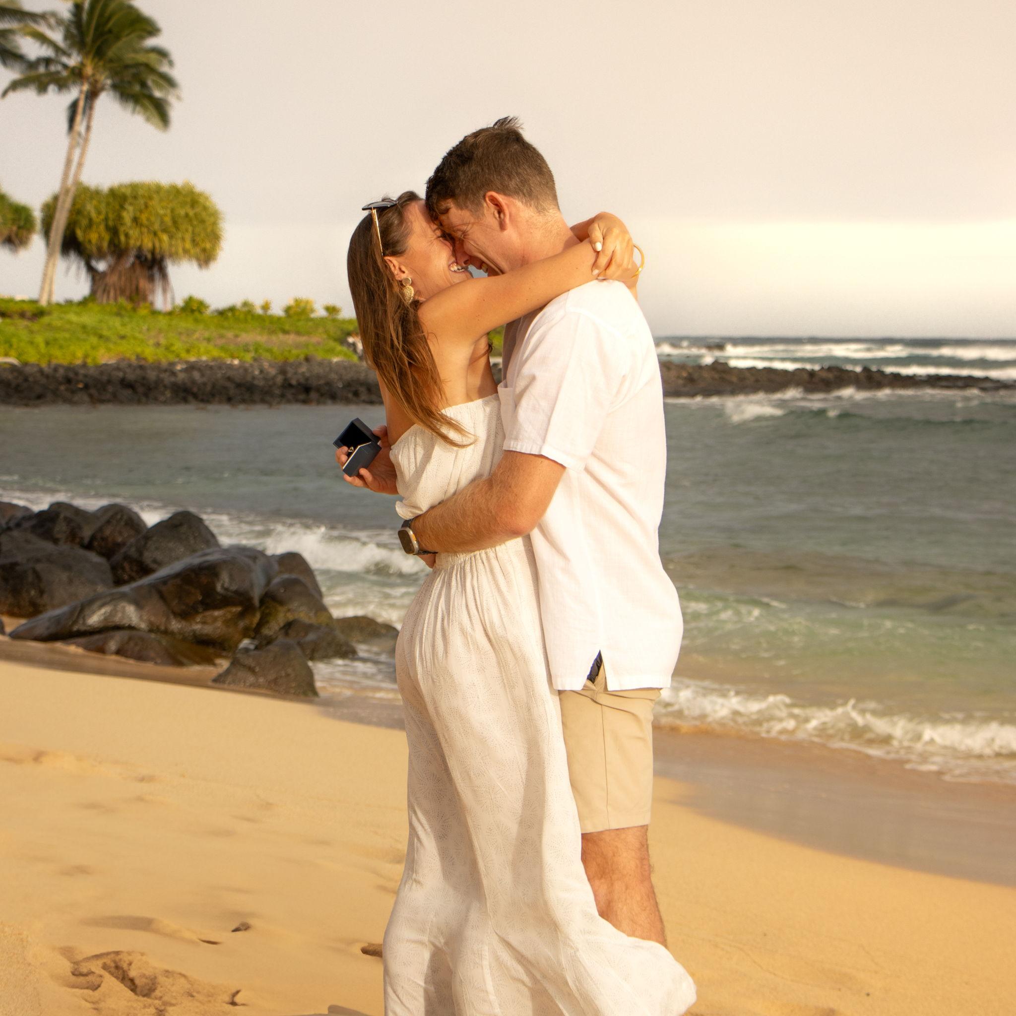 Happiest moment of our lives. Brynne forgot to put the ring on - Mike had to balance it in the box so it didn't fall into the sand!