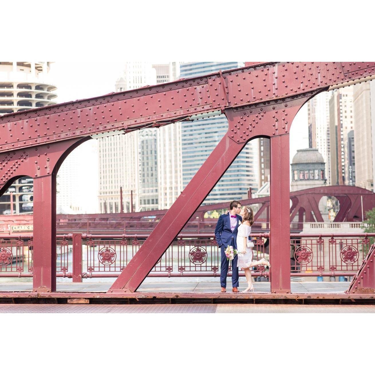 Kissing on an iconic bridge in downtown Chicago