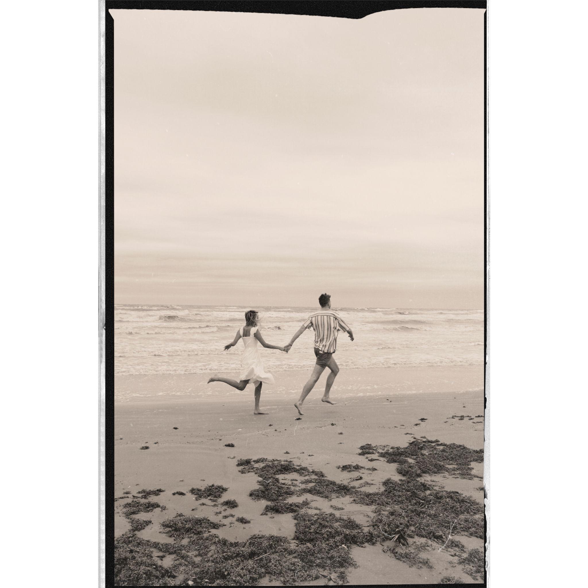 We got engaged on Galveston beach in one of our favorite spots, and not far from one of our first dates. Ask us about the sunglasses story and you'll believe more that fate is real!