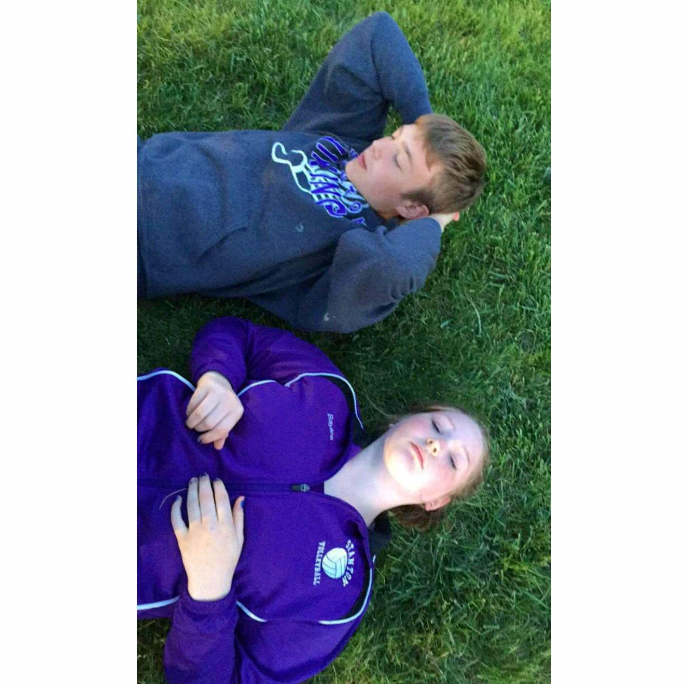 Someone captured this picture, this was before we were "official" and we were stretching at our track meet.