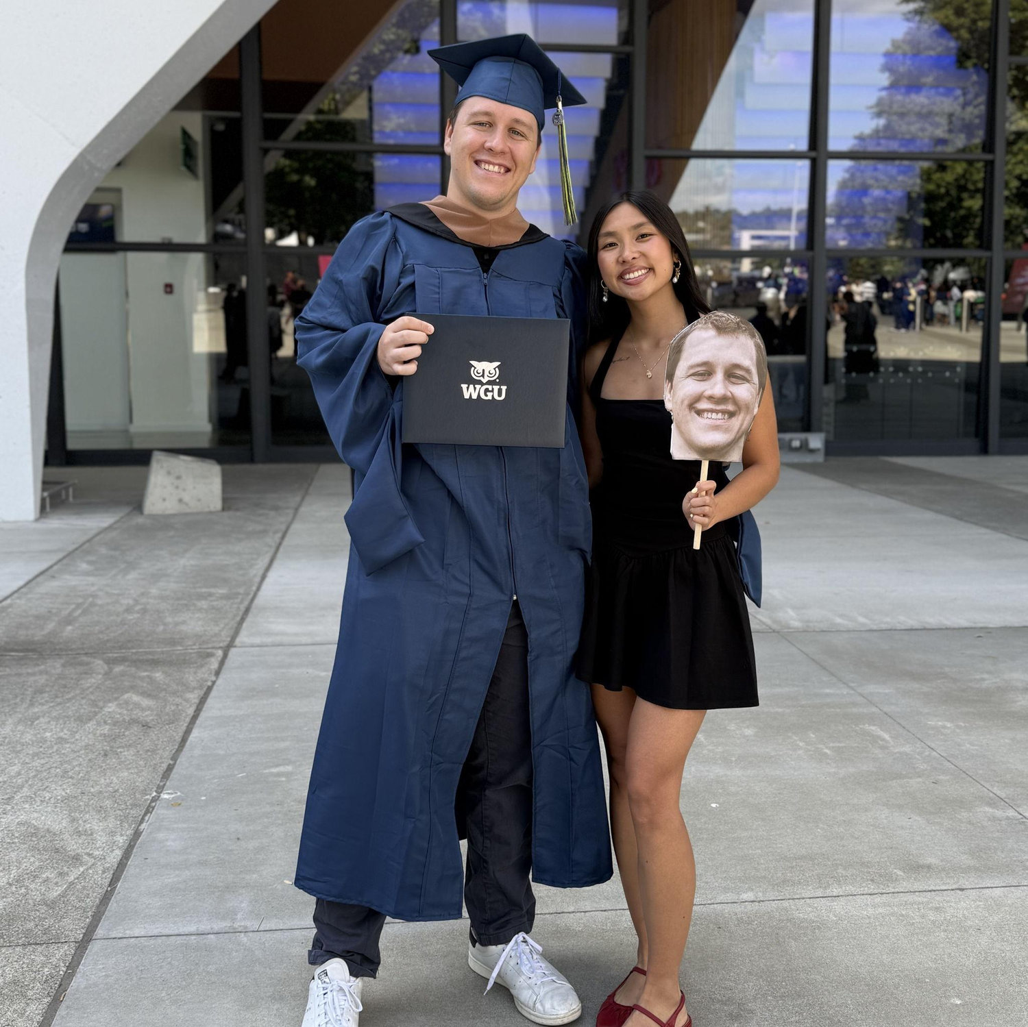 Danielle supporting Korbin at his master’s ceremony