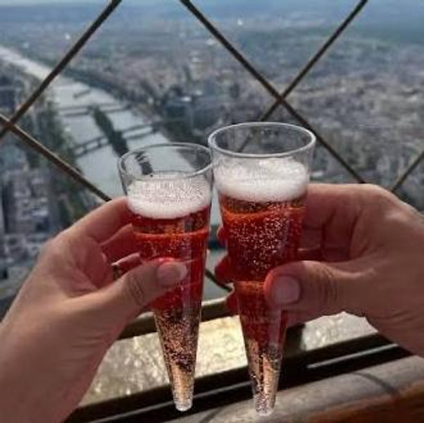 Take us to the top of the Eiffel Tower with some a glass of Champaign!