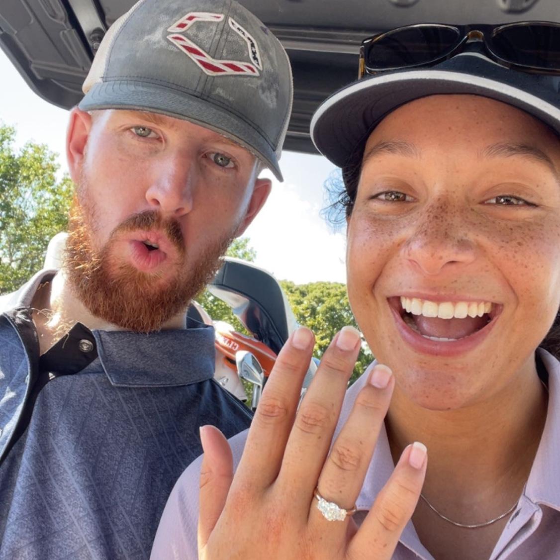 Guised as watching the sun rise before a round of golf, Josh proposed to Paige on his family's annual trip to North Myrtle Beach. Of course, she said yes! Paige proceeded to beat Josh on the course.