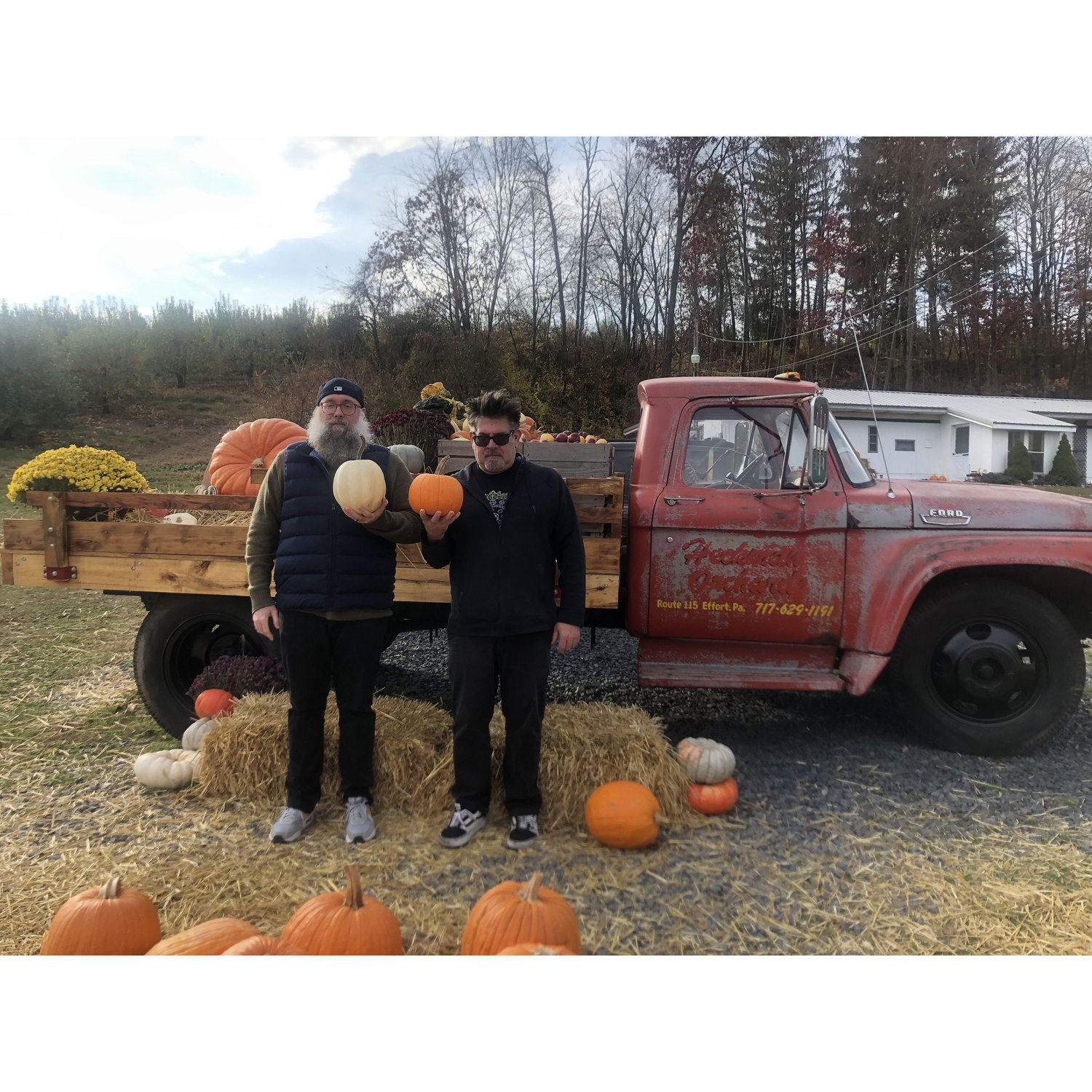 Chris and Dave doing their best "American Gothic" while picking pumpkins
