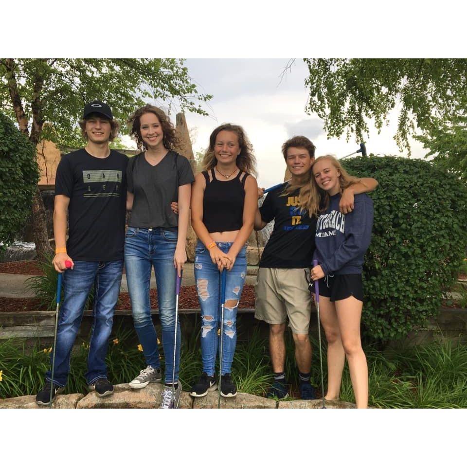 our second Summer together, family mini golfing