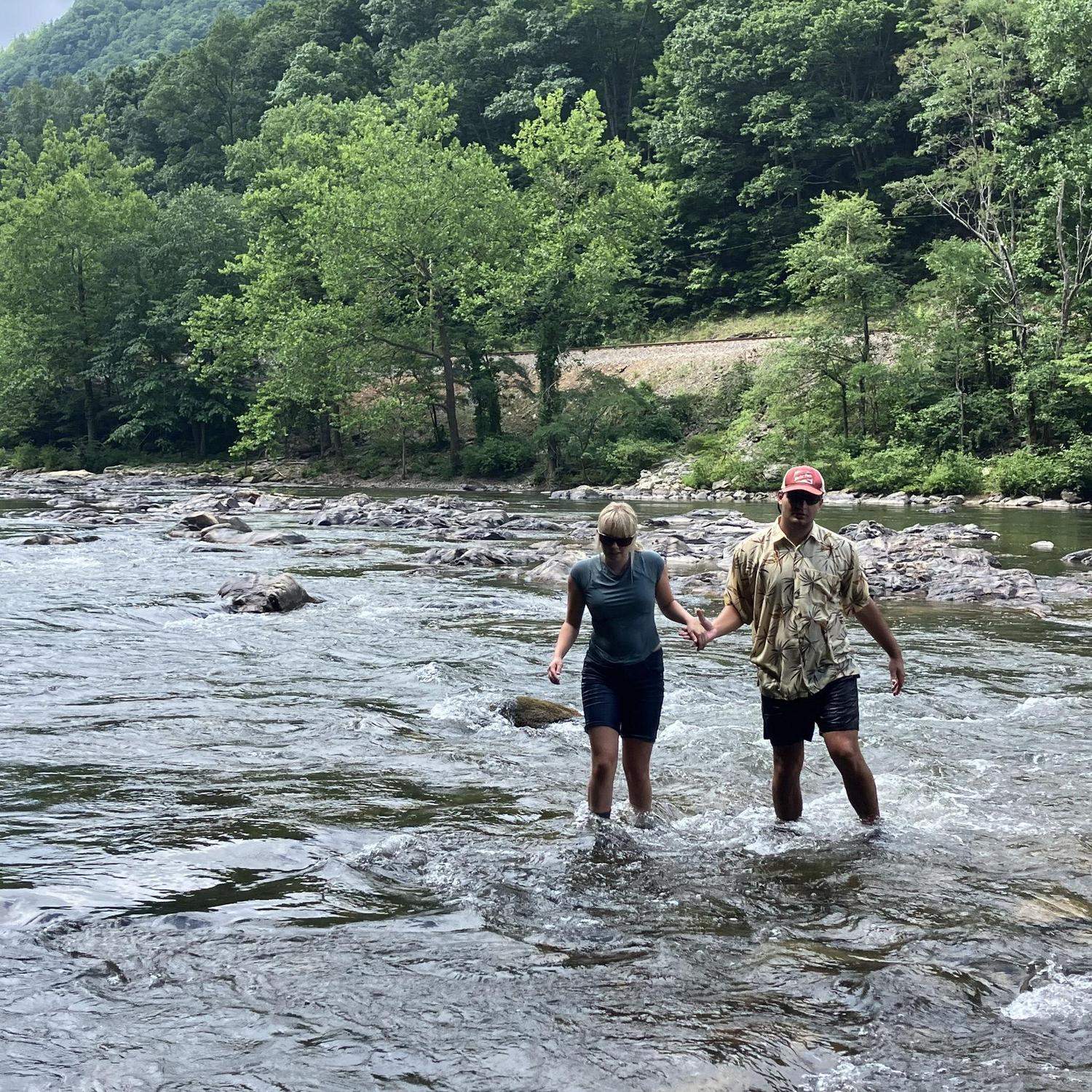 Az and Caroline fishing in the Nolichucky River