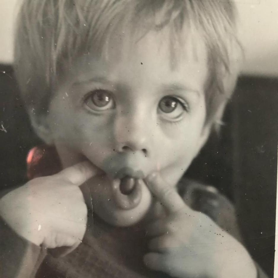 A young Buck trying to create dimples. Only one stuck.