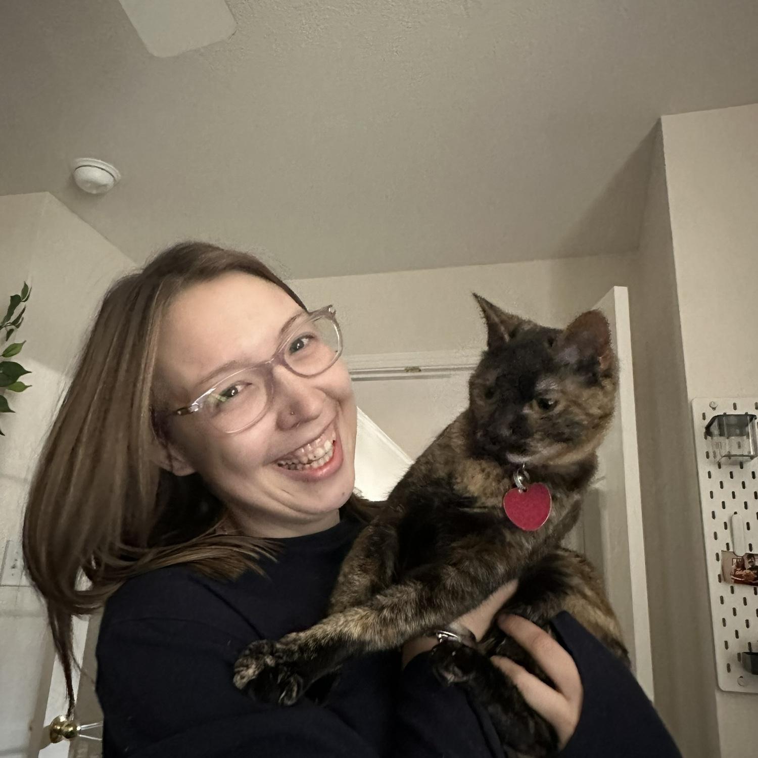 Pepper's not much of a cuddler, even though we try to convince ourselves that she is.