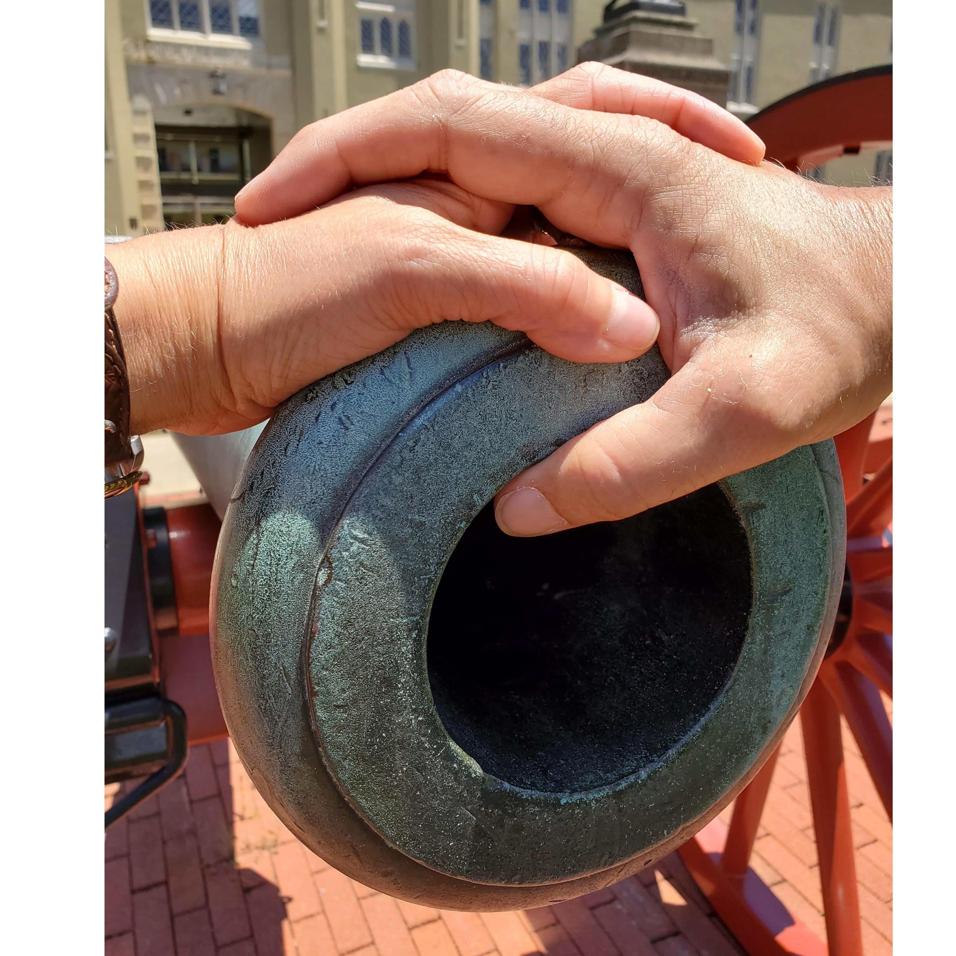 Our hands on a cannon