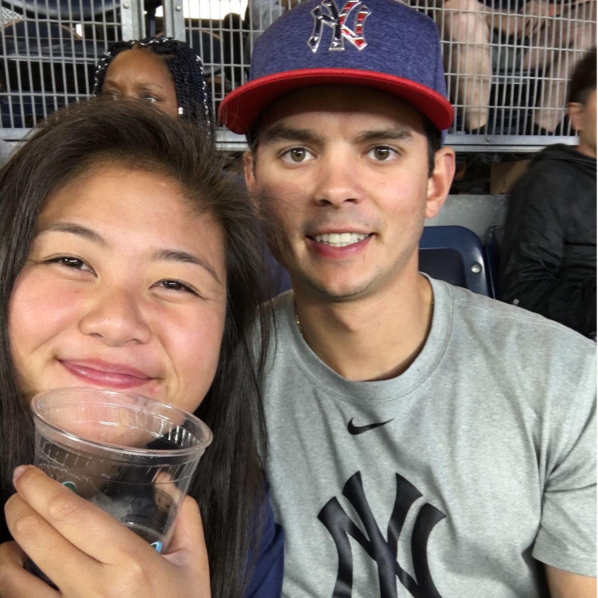 Yankees games consist of James taking pics and getting autographs while CJ drinks and finds the good eats