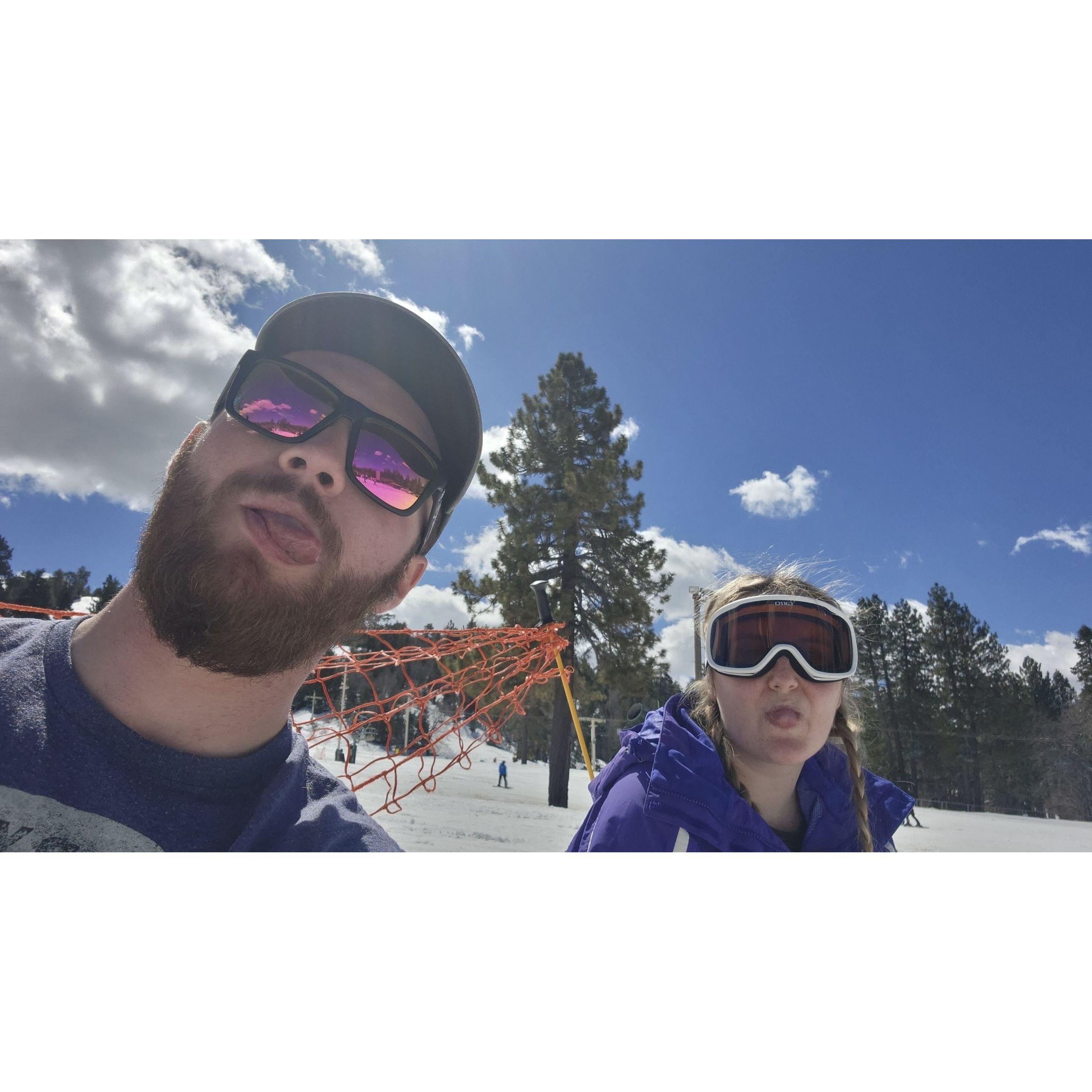 Bailey teaching Mina how to snowboard... she spent a lot more time on the snow than on the board...