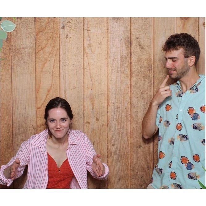 This was taken at Ericka & Alex's wedding, right after Sam said "Look, I'm gonna be a chair for this one!" Dominic looks on, wearing his party shirt