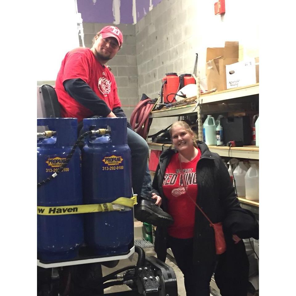 2nd month anniversary- ice level hockey and a Zamboni ride for Chris
