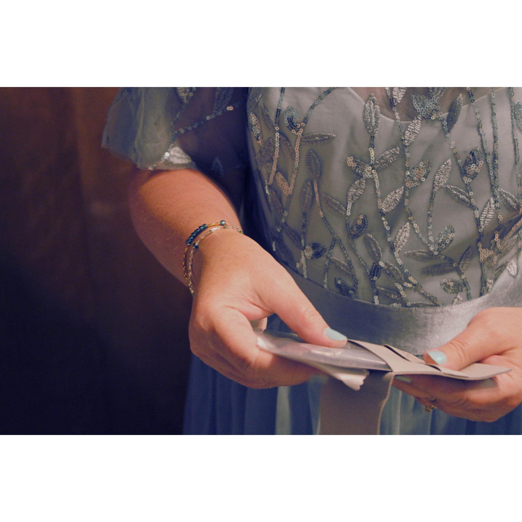 Jennifer opening her gift