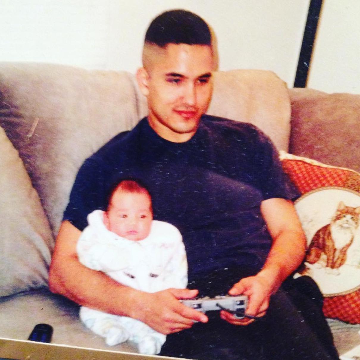 Brittany’s father (Eric J. Smith) and her (playing video games since day one)