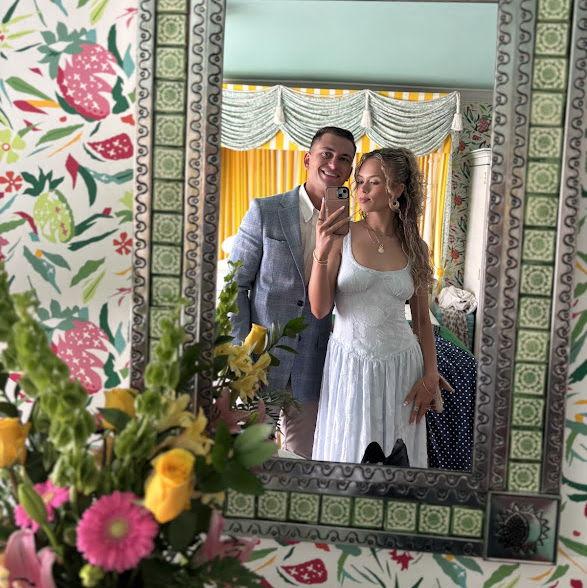 Taken right before we got engaged. We didn't know it then, but you can actually see the engagement ring box in the photo hahah.