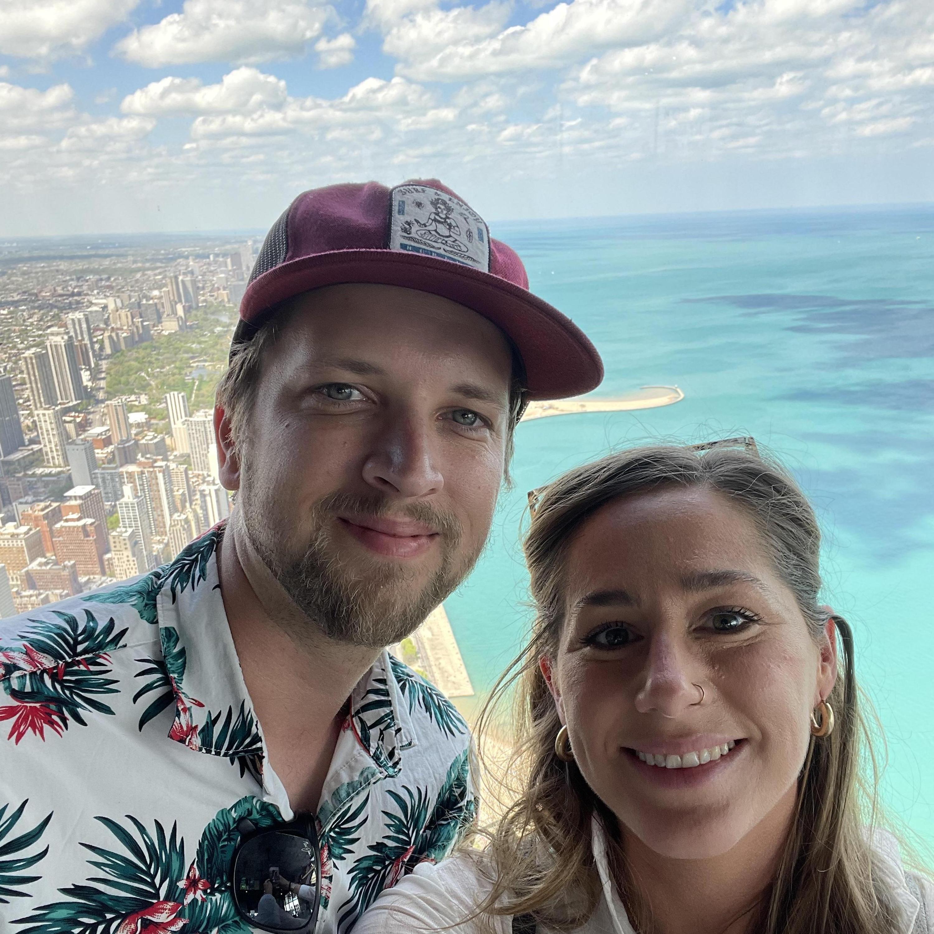 We love traveling! Covid has been a reality for most of our relationship, so we've had limited opportunities, but we've made the most of it! This is the top of Willis (Sear's) Tower in Chicago.