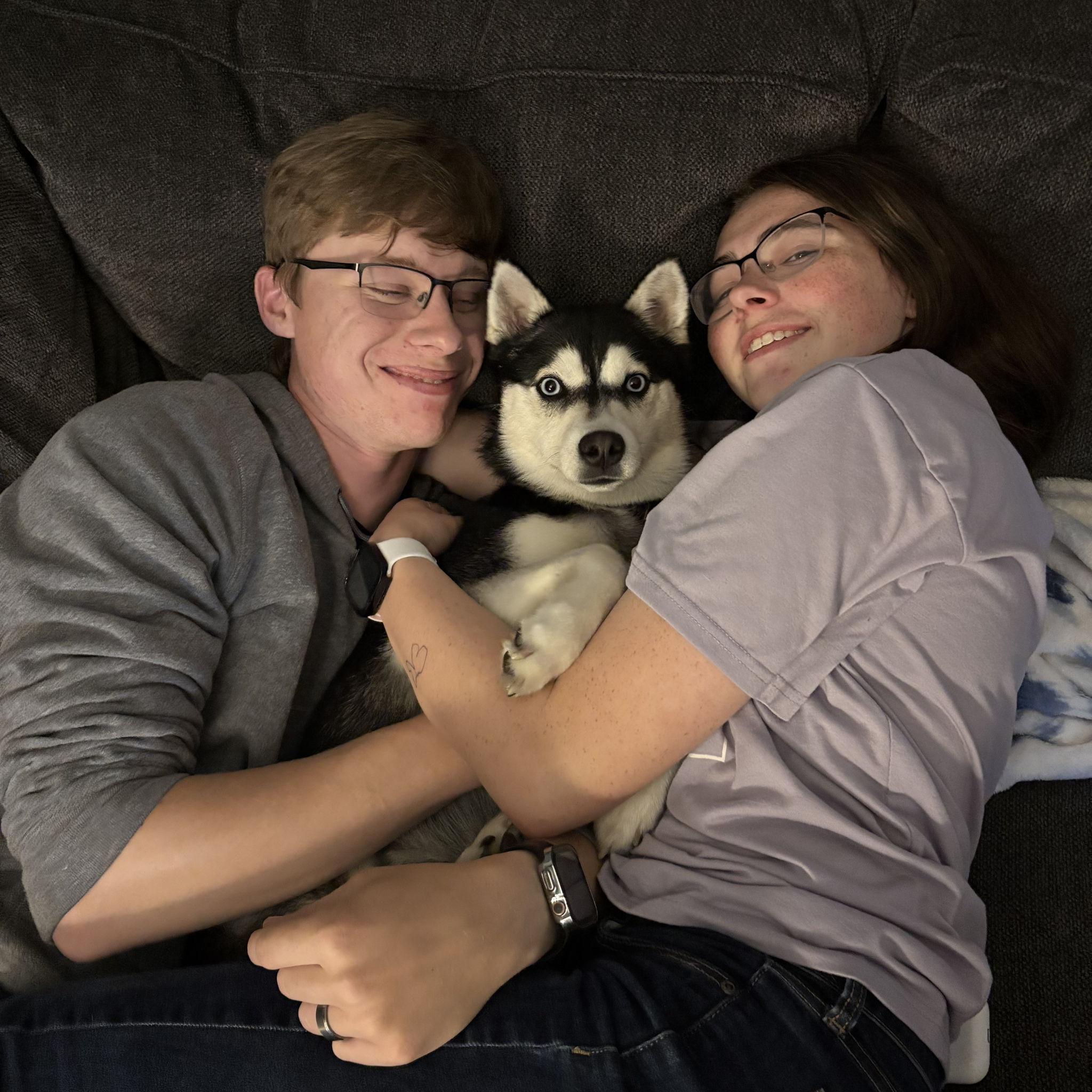 Snuggling with Mom and Dad!