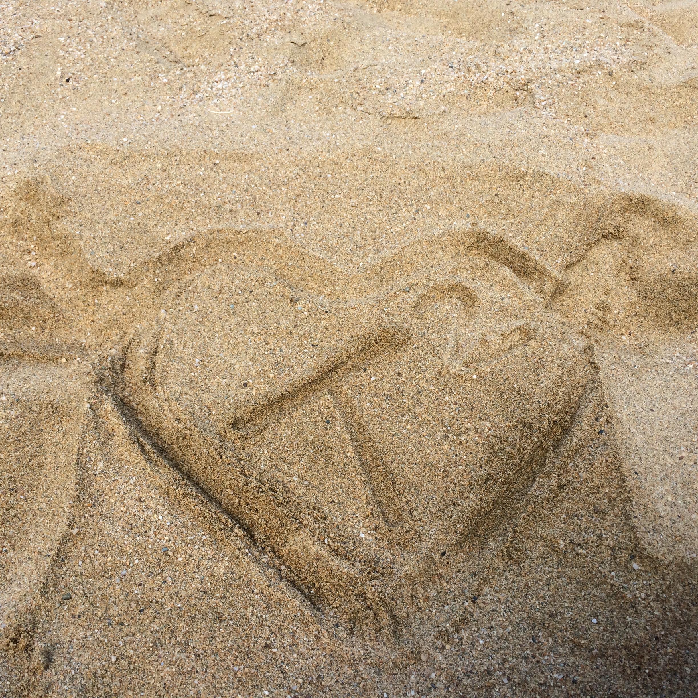 Before we became Tcubed we wrote our love on a beach in Tobago