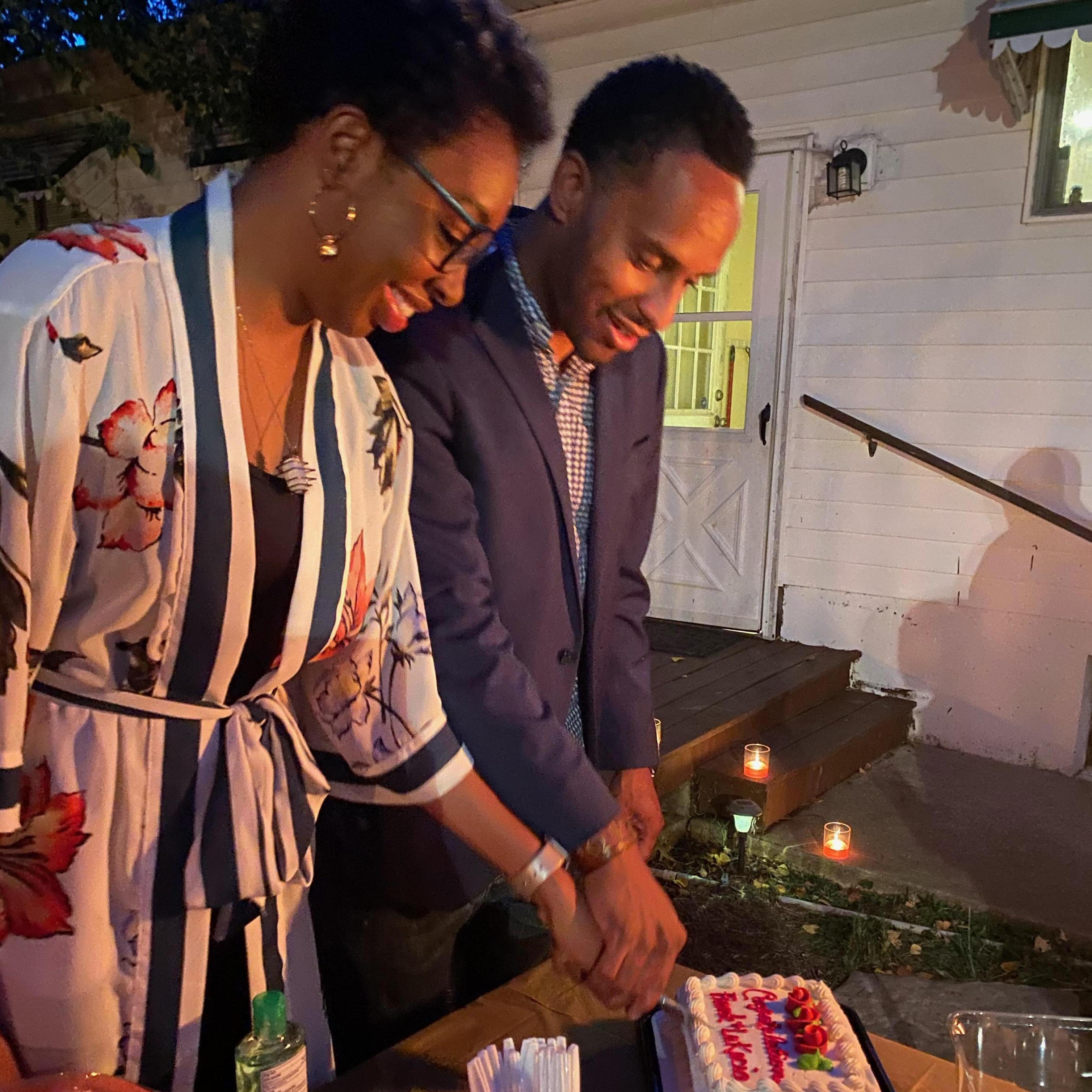 Cutting our engagement cake!