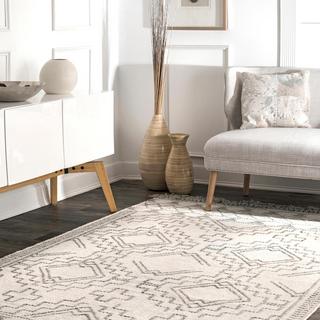 Tammie Tassel Area Rug