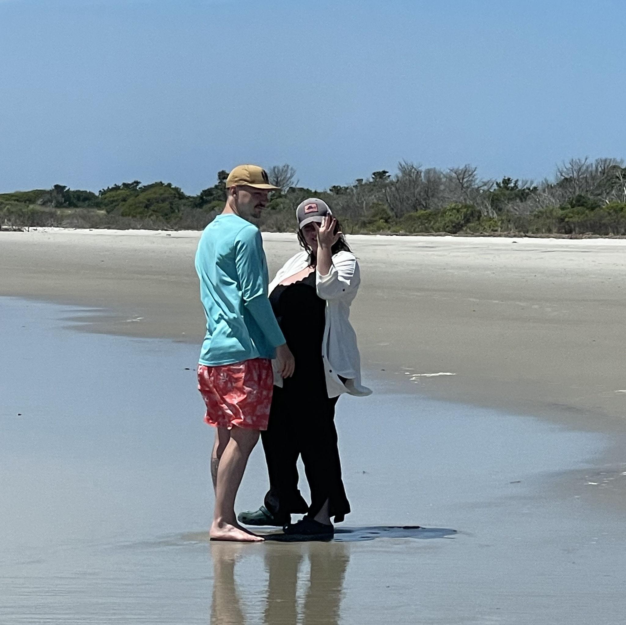 Showing off the new ring after saying yes on Portsmouth Island, NC! -07-10-25-
