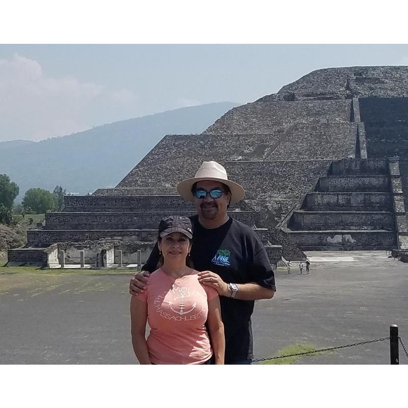 Background is the Pre-Hispanic Incredible Pyramid of the Sun Teotihuacan.  Celia climbed all the way to the top, No sir not for me.