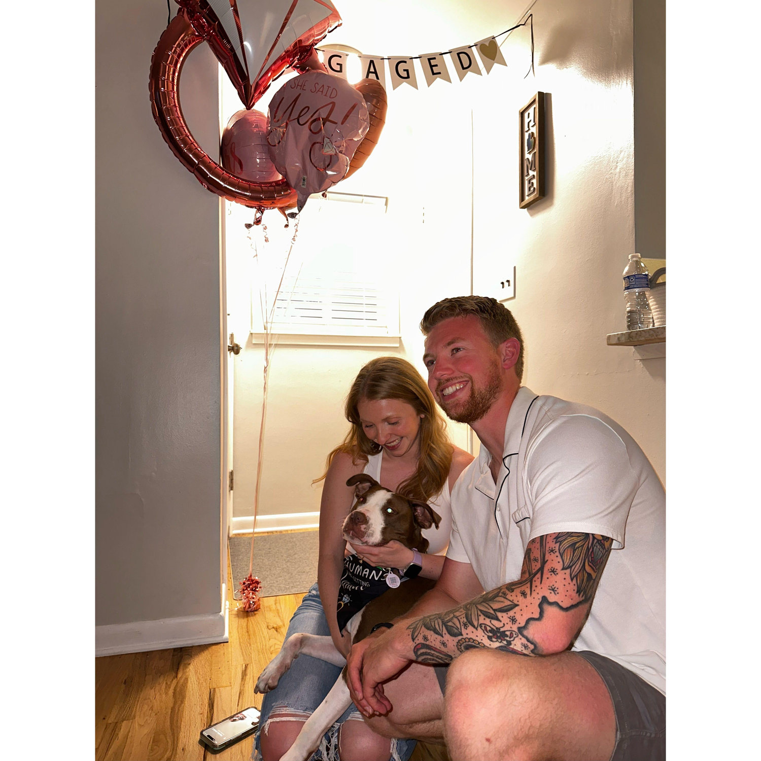 Madi, Pat, and their dog Gus at their engagement party!