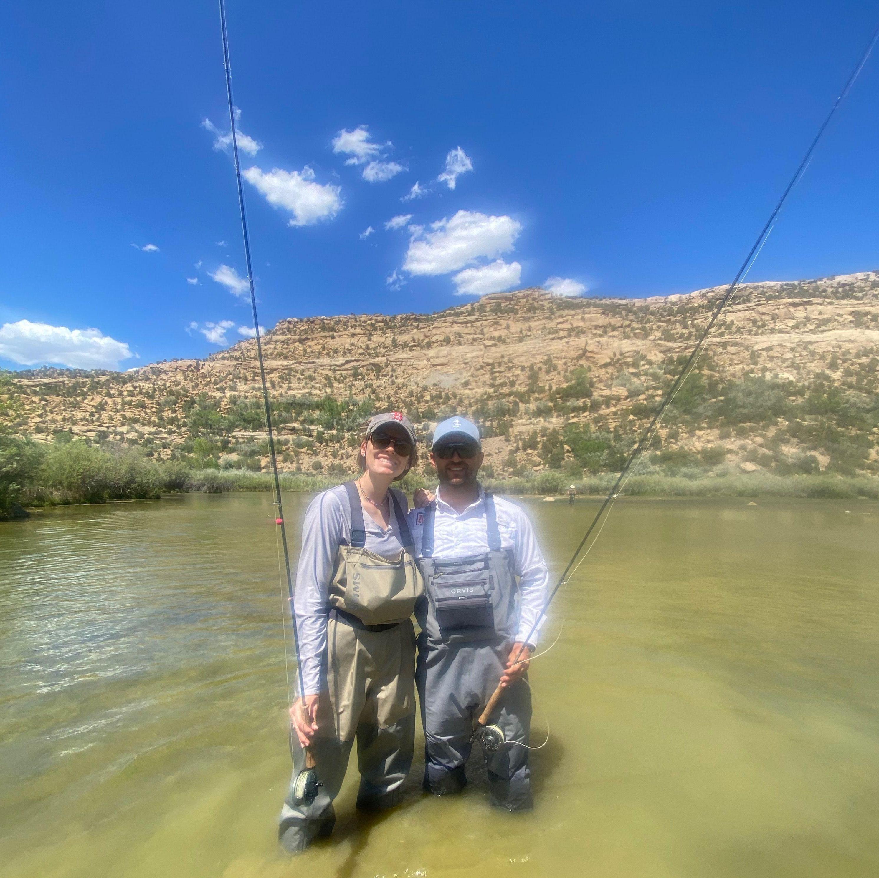 The pair fly fishing in New Mexico in June 2022.