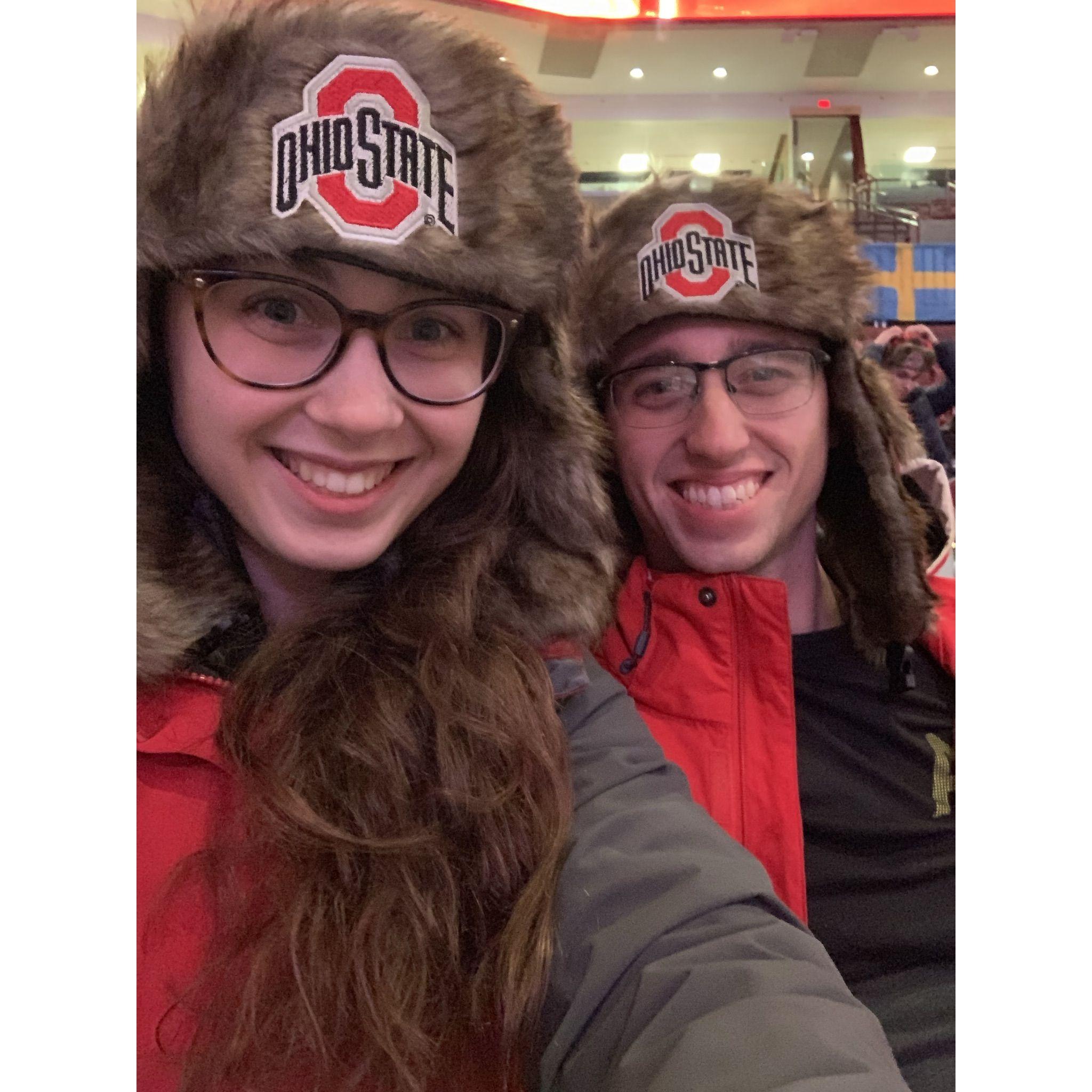 She even stood by him in line for 3 hours to get a free hat (there were extras after the game)