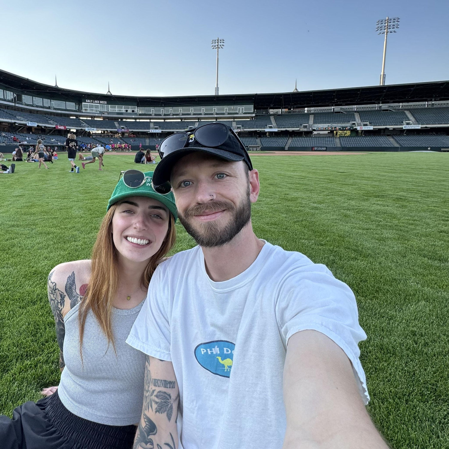 We don't love watching baseball but we love hanging out on the field