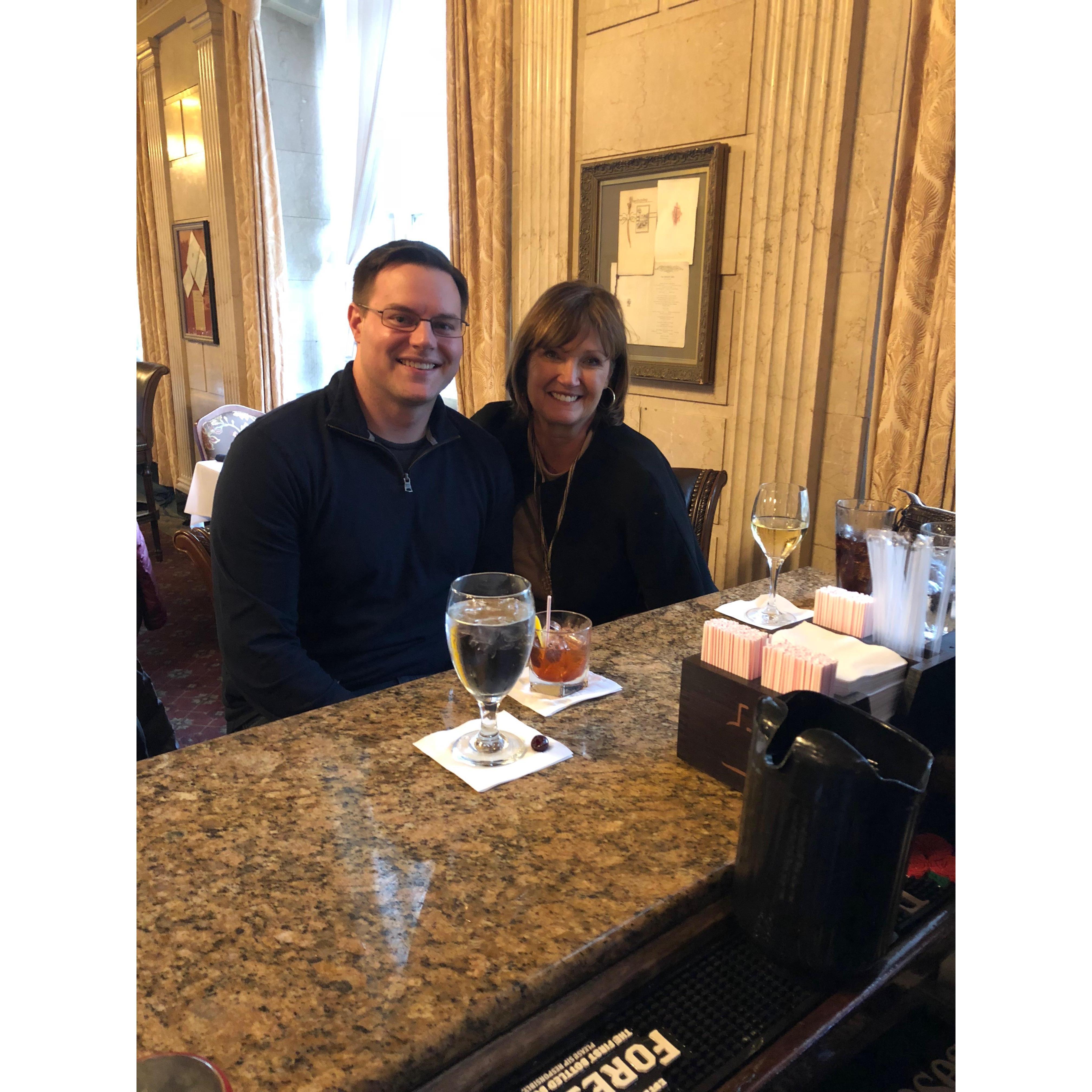 Roger asked both Hailey's parents blessing to propose in October 2018. This photo is of Hailey's mom, Malinda, & Roger at the Brown Hotel bar in Louisville, KY right after he asked for her blessing.