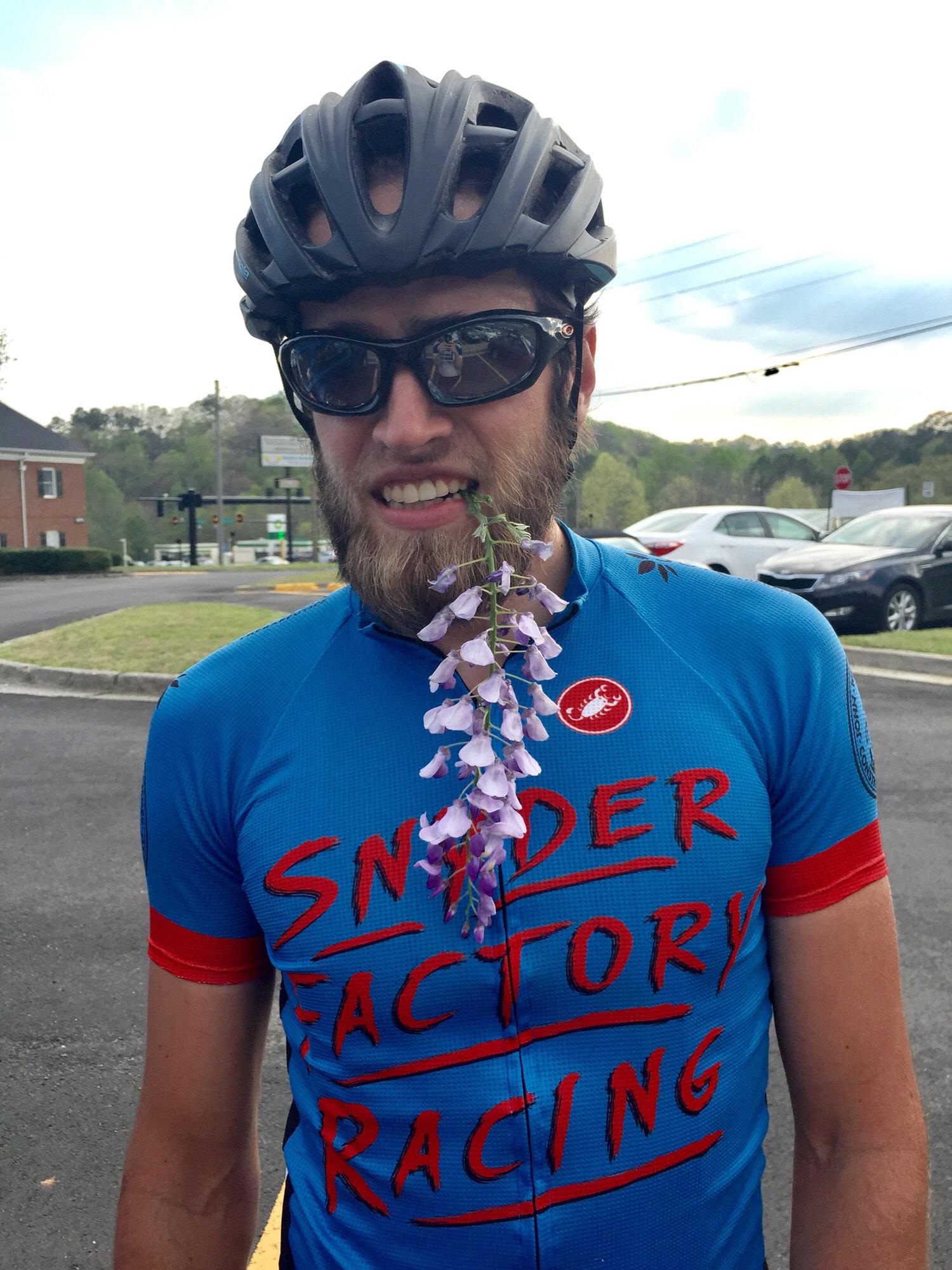 Kevin being all sweet bringing me some flowers after he dropped me on the group ride on our 2 year anniversary. Letting me capture this picture made everything better