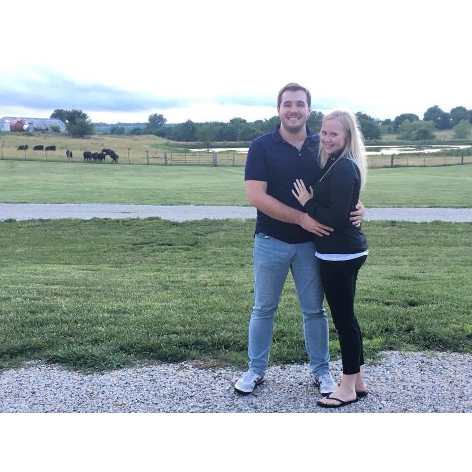We got engaged on June 21, 2018 - huge shout out to our photobombers in the back!
