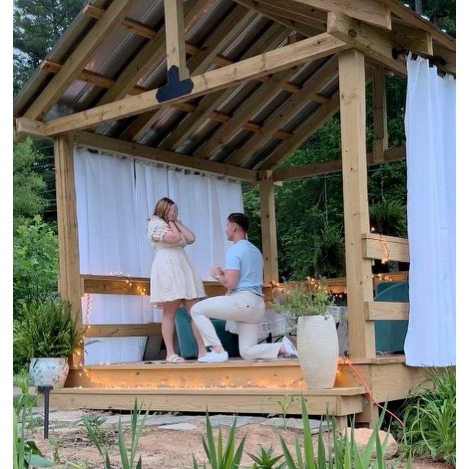 Cody carefully planned to propose at the Biltmore. However, he thought that the Gazebo at our AirBnB was more intimate! He set up two cameras and filmed the entire thing including our first dinner!