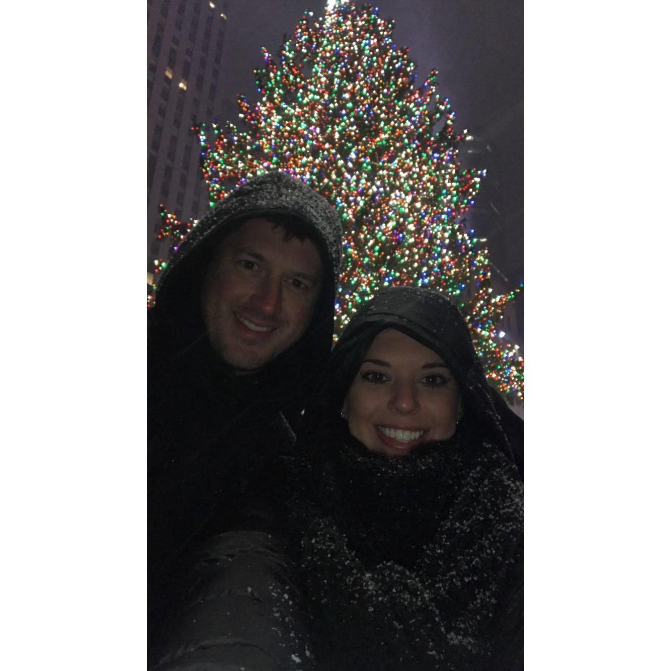 NYC BUCKET LIST! First picture infront of Rockefeller Tree at Christmastime! It SNOWED!